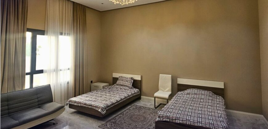 Elegant 8-Bedroom Brand New Villa for Sale in Umm Al Amad